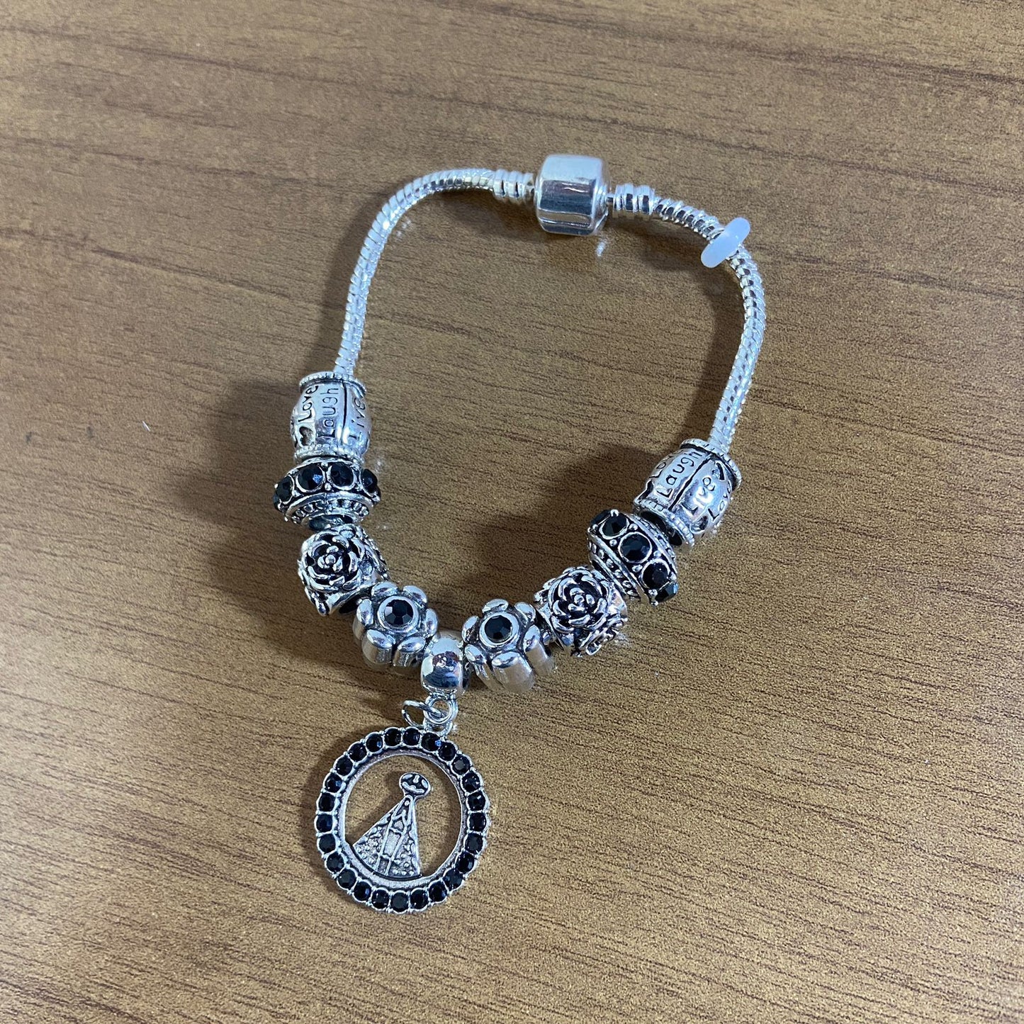 PULSEIRA PRATEADA NOSSA SENHORA APARECIDA COM BERLOQUES MOD1 (1 UNIDADE)