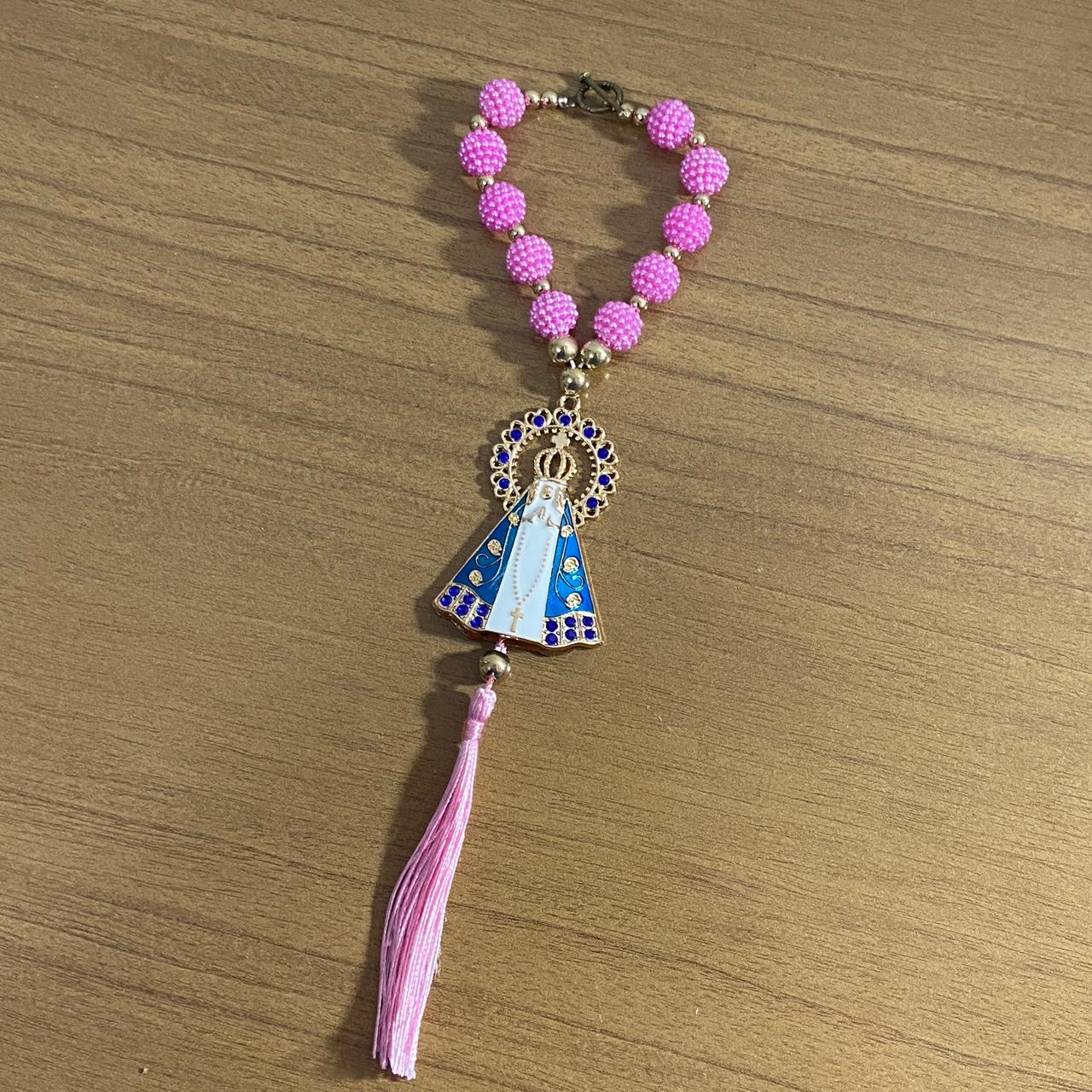 DEZENA PARA CARRO NOSSA SENHORA APARECIDA BRANCA AMORA ROSA E STRASS AZUL 12MM (3 UNIDADES)