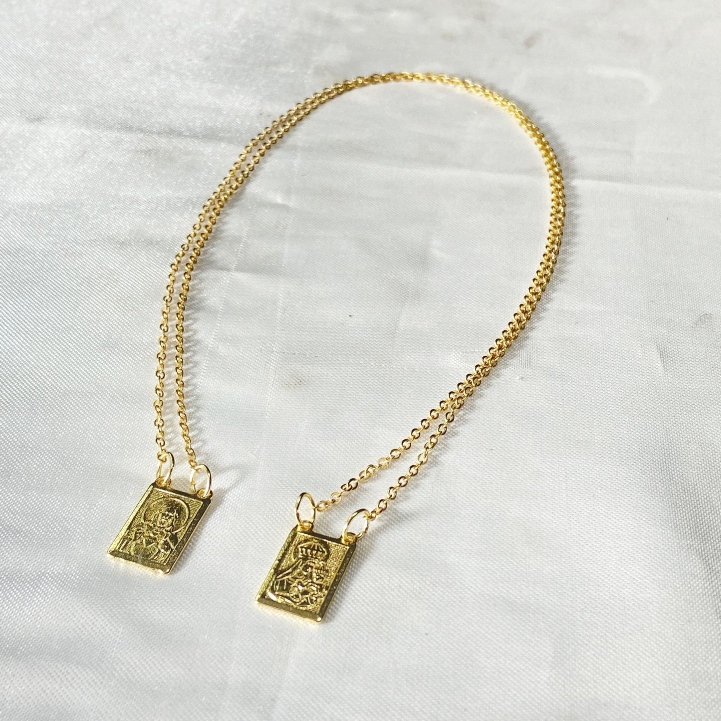 ESCAPULÁRIO DOURADO NA CARTELA SAGRADO CORAÇÃO DE JESUS E NOSSA SENHORA DO CARMO (6 UNIDADES)