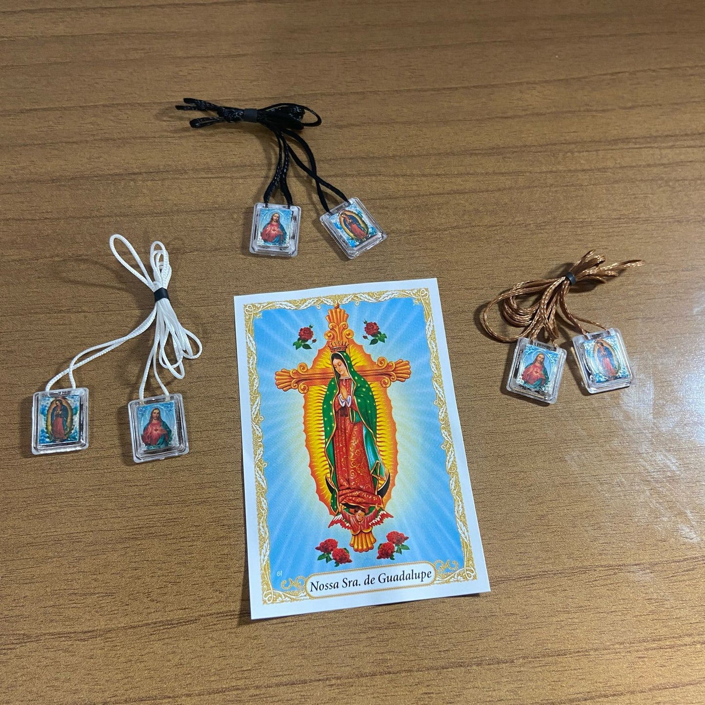ESCAPULÁRIO CORDINHA SAGRADO CORAÇÃO DE JESUS E NOSSA SENHORA DE GUADALUPE (12 UNIDADES)