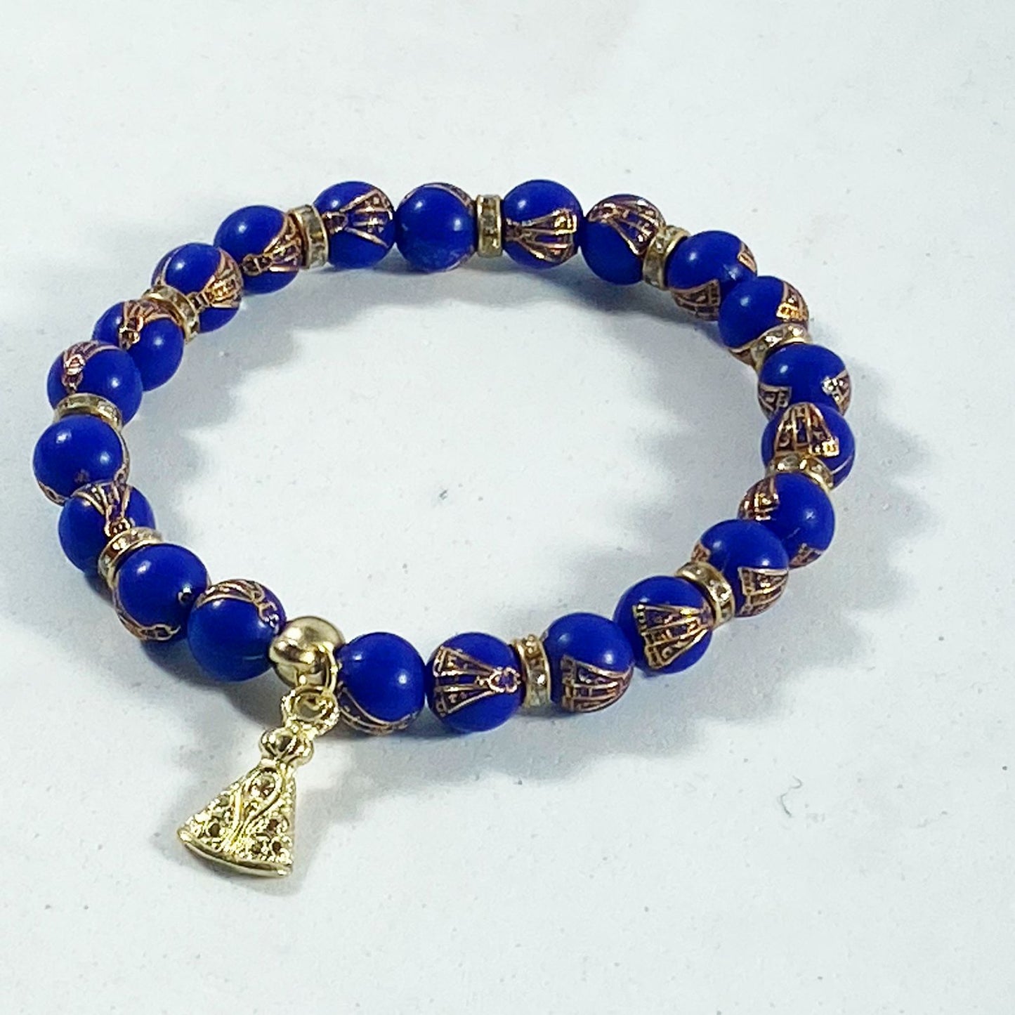 PULSEIRA PÉROLA CONTAS DECORADAS AZUL NOSSA SENHORA APARECIDA (06 UNIDADES)