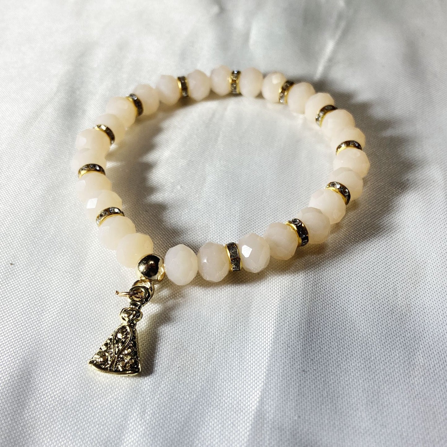 PULSEIRA CRISTAL CREME NOSSA SENHORA APARECIDA (06 UNIDADES)