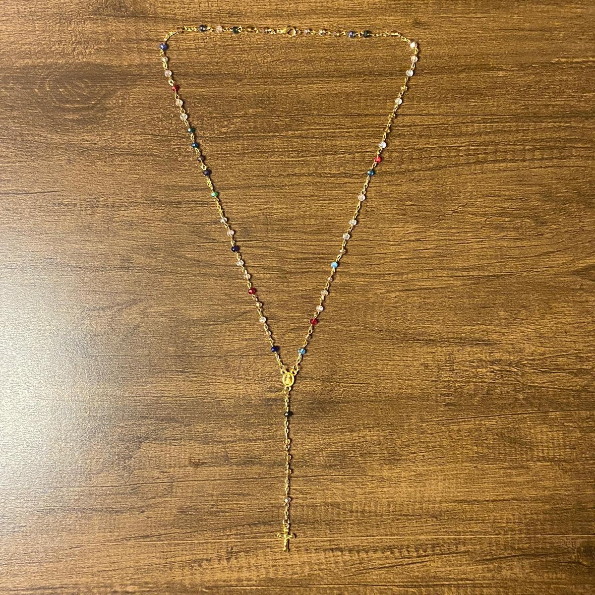 TERÇO CRISTAL NA GARRAFA NOSSA SENHORA APARECIDA CORES SORTIDAS 4MM DOURADO (12 UNIDADES)