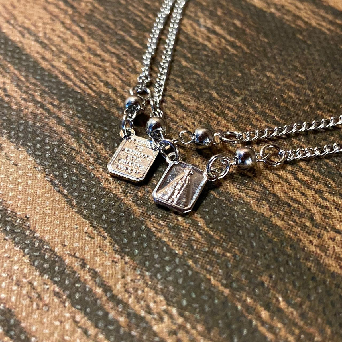 PULSEIRA ESCAPULÁRIO INOX SAGRADO CORAÇÃO DE JESUS E NOSSA SENHORA APARECIDA (3 UNIDADES)
