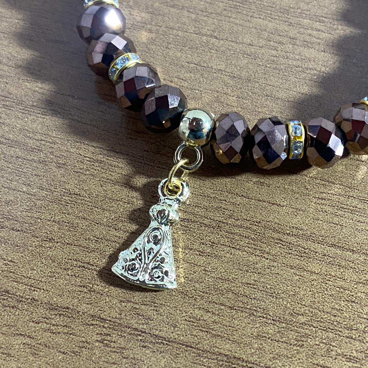 PULSEIRA CRISTAL MARROM NOSSA SENHORA APARECIDA (06 UNIDADES)