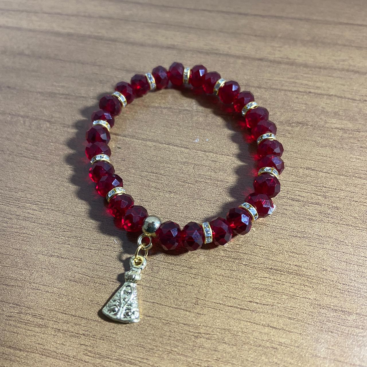 PULSEIRA CRISTAL VERMELHA TRANSPARENTE NOSSA SENHORA APARECIDA (06 UNIDADES)