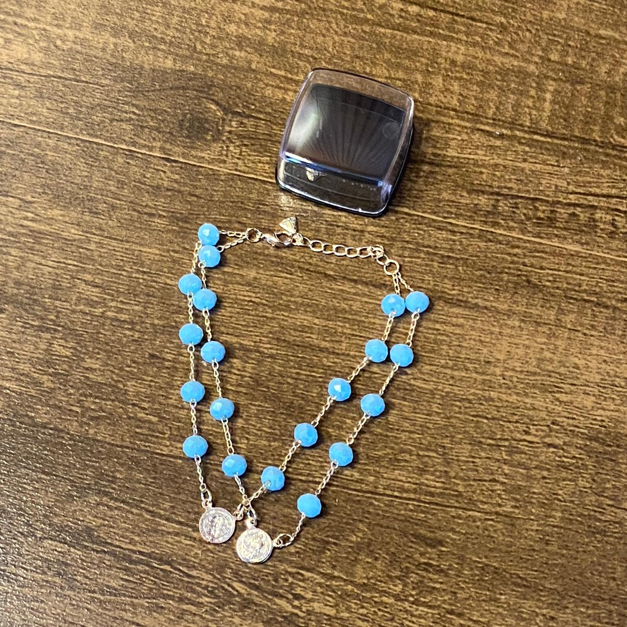 PULSEIRA ESCAPULÁRIO CRISTAL AZUL CLARO MEDALHA SÃO BENTO (3 UNIDADES)
