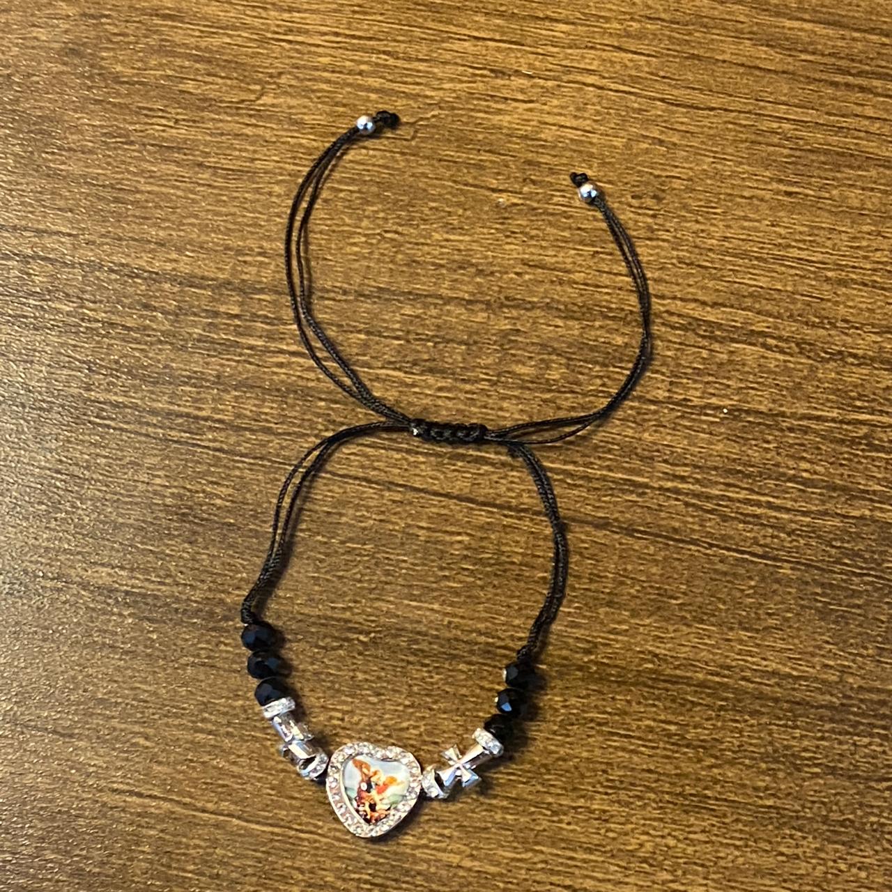 PULSEIRA REGULÁVEL CRISTAL PRETO COM MEDALHA RESINADA SÃO MIGUEL ARCANJO ( 01 UNIDADE)