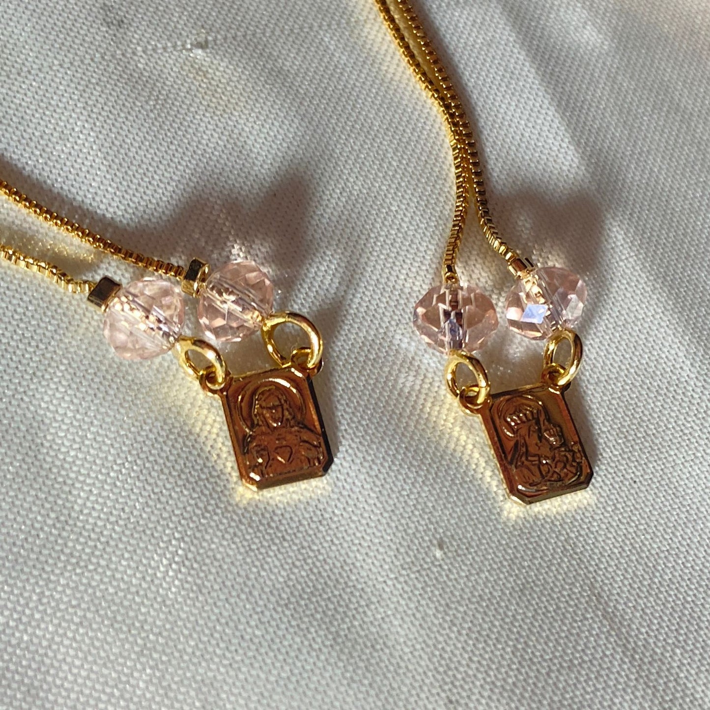 PULSEIRA ESCAPULARIO CRISTAL ROSA TRANSPARENTE MOD2 (3 UNIDADES)