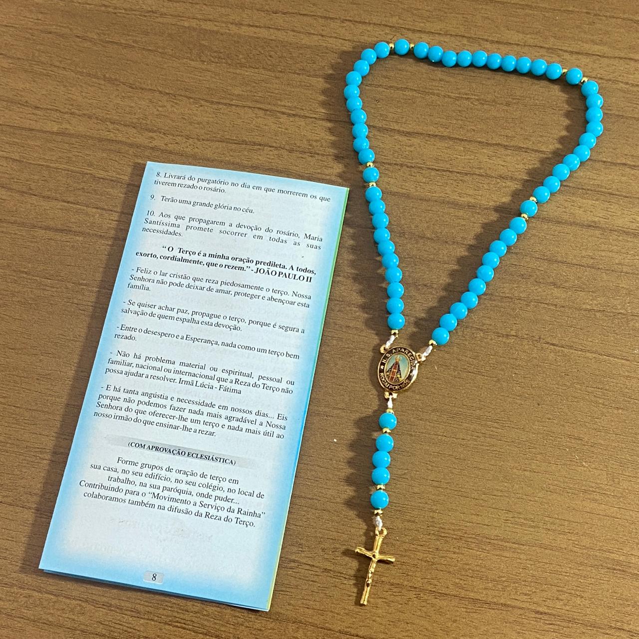 TERÇO PÉROLA AZUL NOSSA SENHORA APARECIDA 6MM (1 UNIDADE)