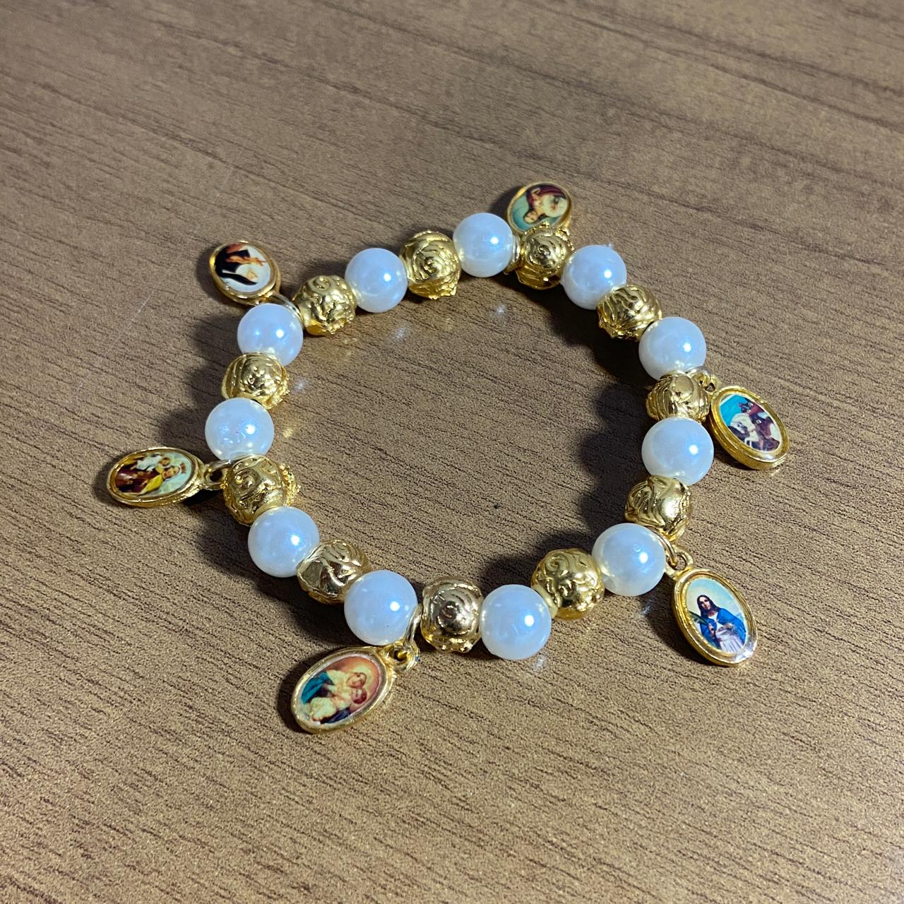 PULSEIRA DOURADA COM PÉROLA TODOS OS SANTOS (01 UNIDADE)