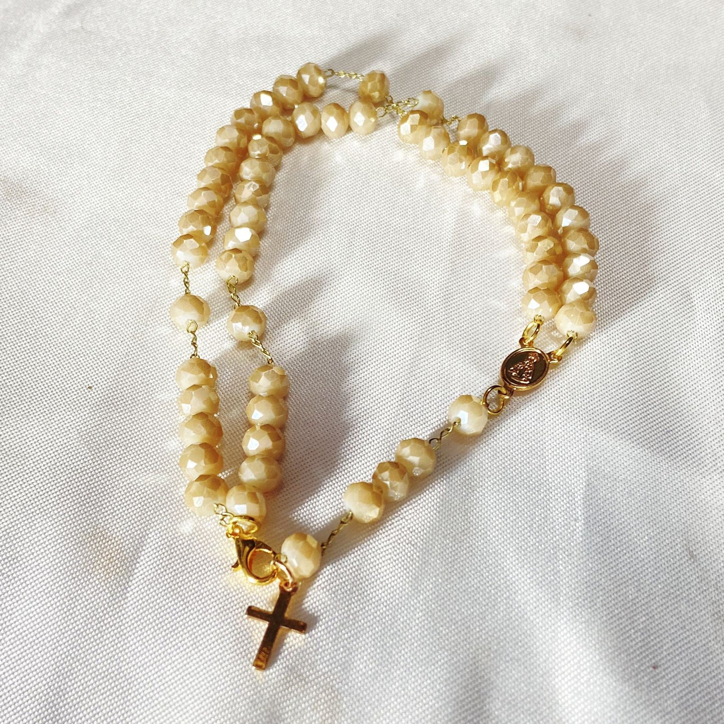 TERÇO PULSEIRA CRISTAL BEGE (3 UNIDADES)
