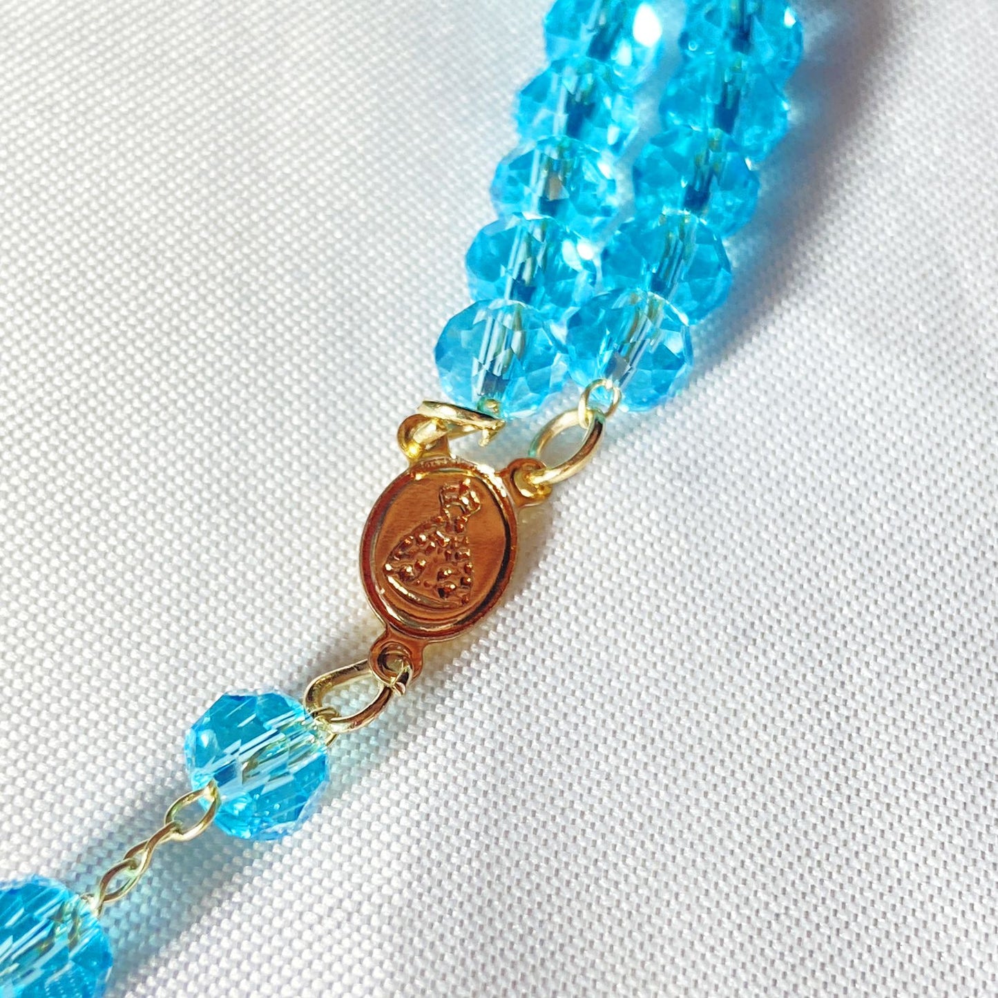 TERÇO PULSEIRA CRISTAL AZUL TRANSPARENTE (3 UNIDADES)