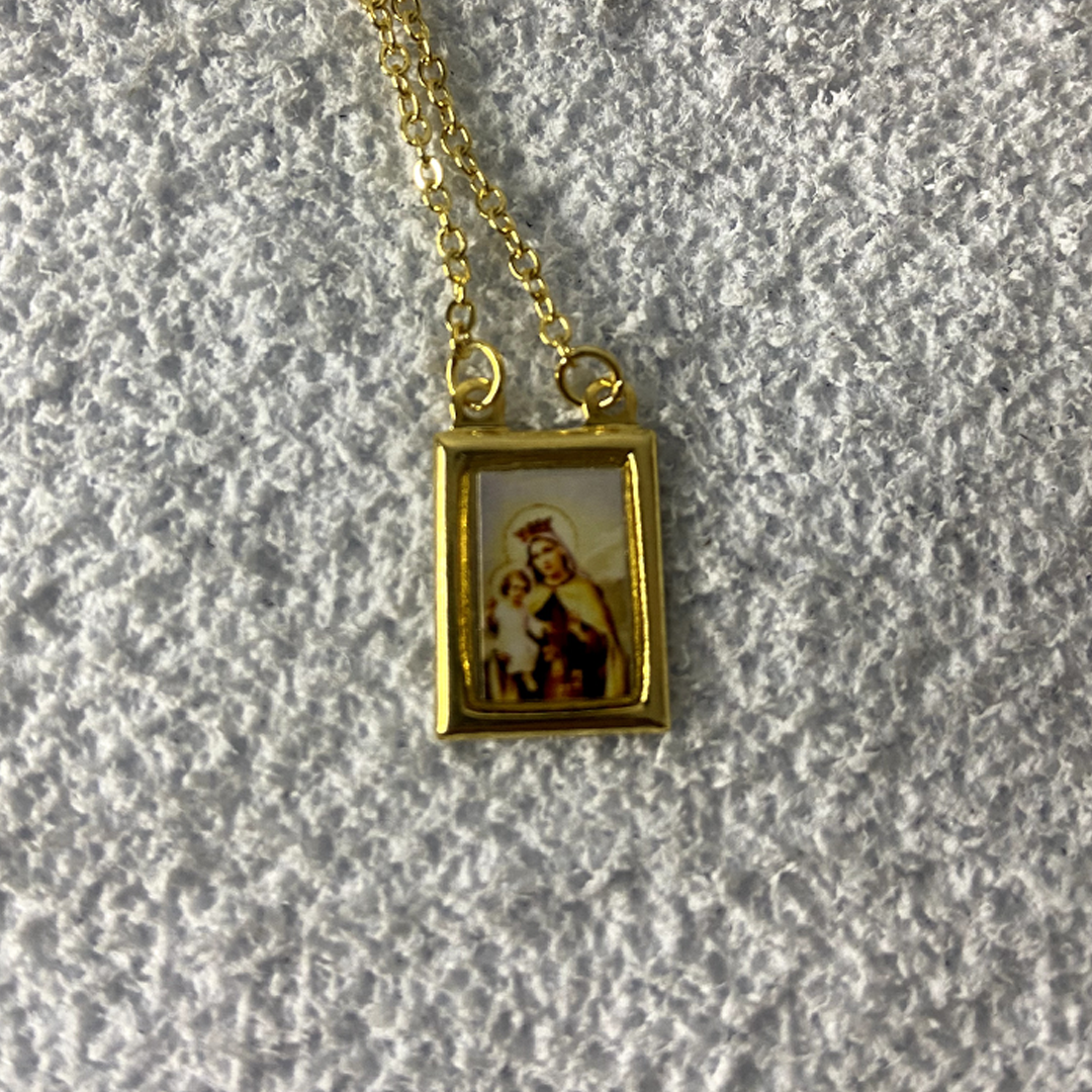 ESCAPULÁRIO DE INOX DOURADO SAGRADO CORAÇÃO DE JESUS E NOSSA SENHORA DO CARMO (6 UNIDADES)