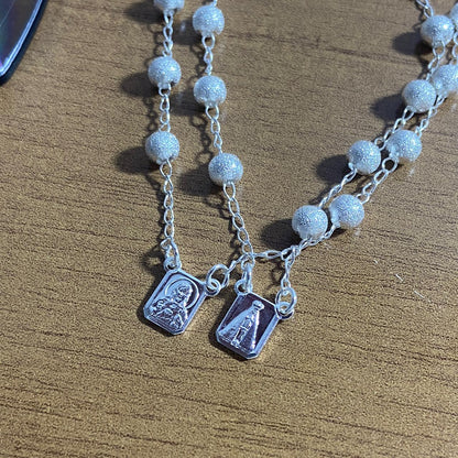 PULSEIRA ESCAPULÁRIO PRATEADA (3 UNIDADES)