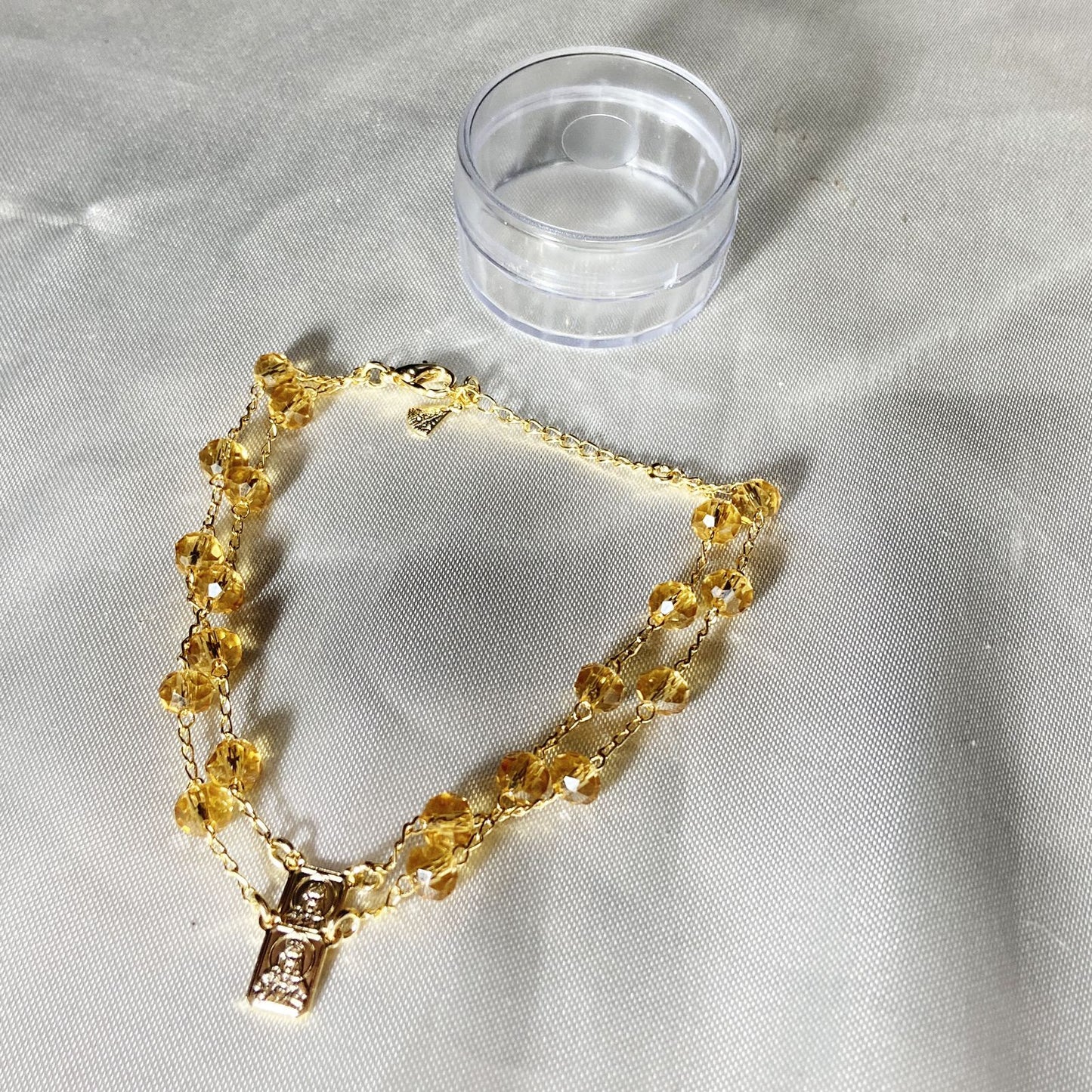 PULSEIRA ESCAPULARIO CRISTAL BEGE TRANSPARENTE (3 UNIDADES)