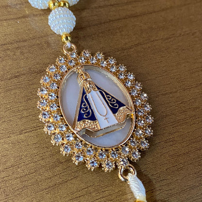 DEZENA PARA CARRO NOSSA SENHORA APARECIDA AMORA BRANCA MOD1 10MM (3 UNIDADES)