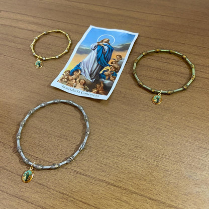PULSEIRA DE MOLA COM MEDALHA NOSSA SENHORA DA IMACULADA CONCEIÇÃO CORES SORTIDAS  (3 UNIDADES)