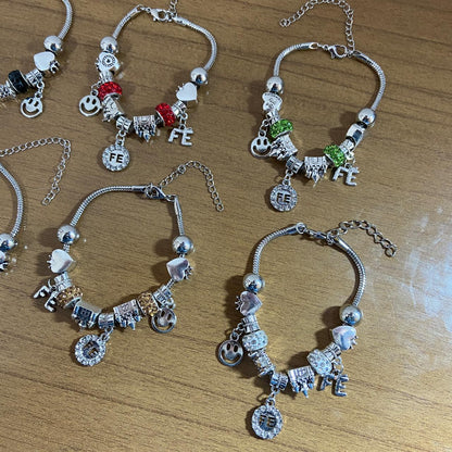 PULSEIRA PRATEADA FÉ COM BERLOQUES  (6 UNIDADES)