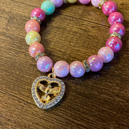 PULSEIRA PÉROLA INFANTIL COM PINGENTE DIVINO ESPÍRITO SANTO  (03 UNIDADES)