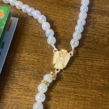 TERÇO PÉROLA  COM STRASS  ANJO DA GUARDA BRANCO 08MM (1 UNIDADE)