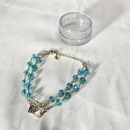 PULSEIRA ESCAPULARIO CRISTAL AZUL TRANSPARENTE (3 UNIDADES)