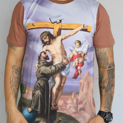 CAMISETA MARROM CLARO SÃO FRANCISCO DE ASSIS COM JESUS NA CRUZ TAMANHO PP (1 UNIDADE)