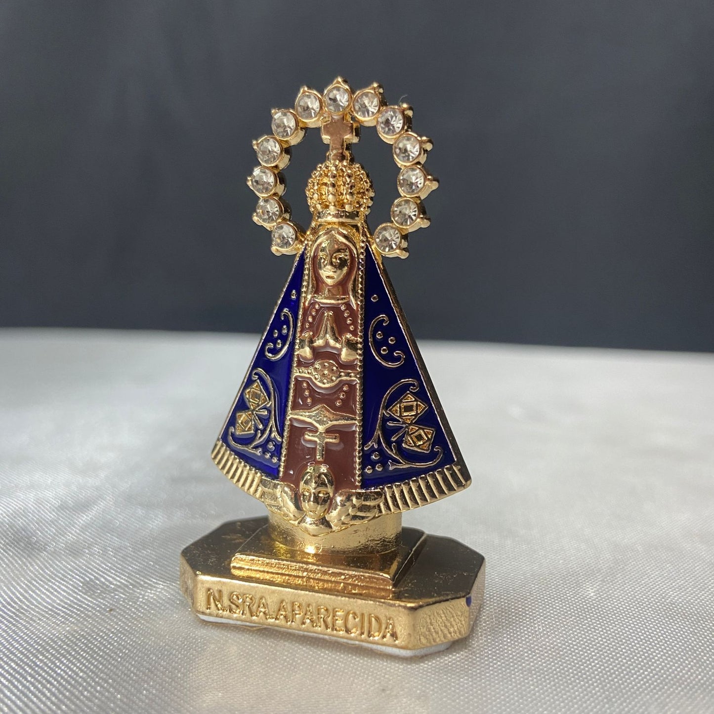 IMAGEM NOSSA SENHORA APARECIDA MARROM PARA CARRO COM STRASS (12 UNIDADES)