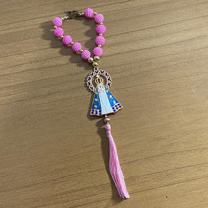 DEZENA PARA CARRO NOSSA SENHORA APARECIDA BRANCA AMORA ROSA E STRASS AZUL 12MM (3 UNIDADES)