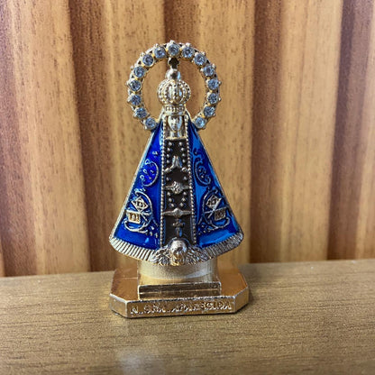 IMAGEM NOSSA SENHORA APARECIDA MARROM AUREOLA COM STRASS PARA CARRO MOD6 5,4M (12 UNIDADES)