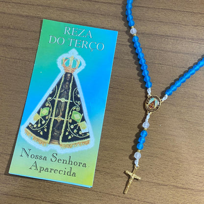 TERÇO PÉROLA AZUL NOSSA SENHORA APARECIDA 6MM MOD 2 (1 UNIDADE)