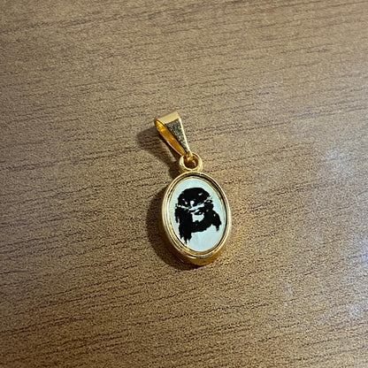 PINGENTE DOURADO RESINADO FACE DE CRISTO  (5 UNIDADES)