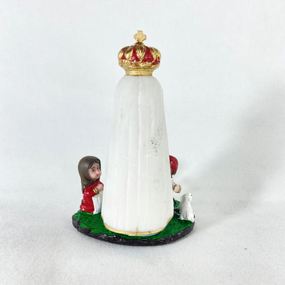 IMAGEM DE RESINA NACIONAL NOSSA SENHORA DE FÁTIMA COM PASTORES INFANTIL 15CM (1 UNIDADE)