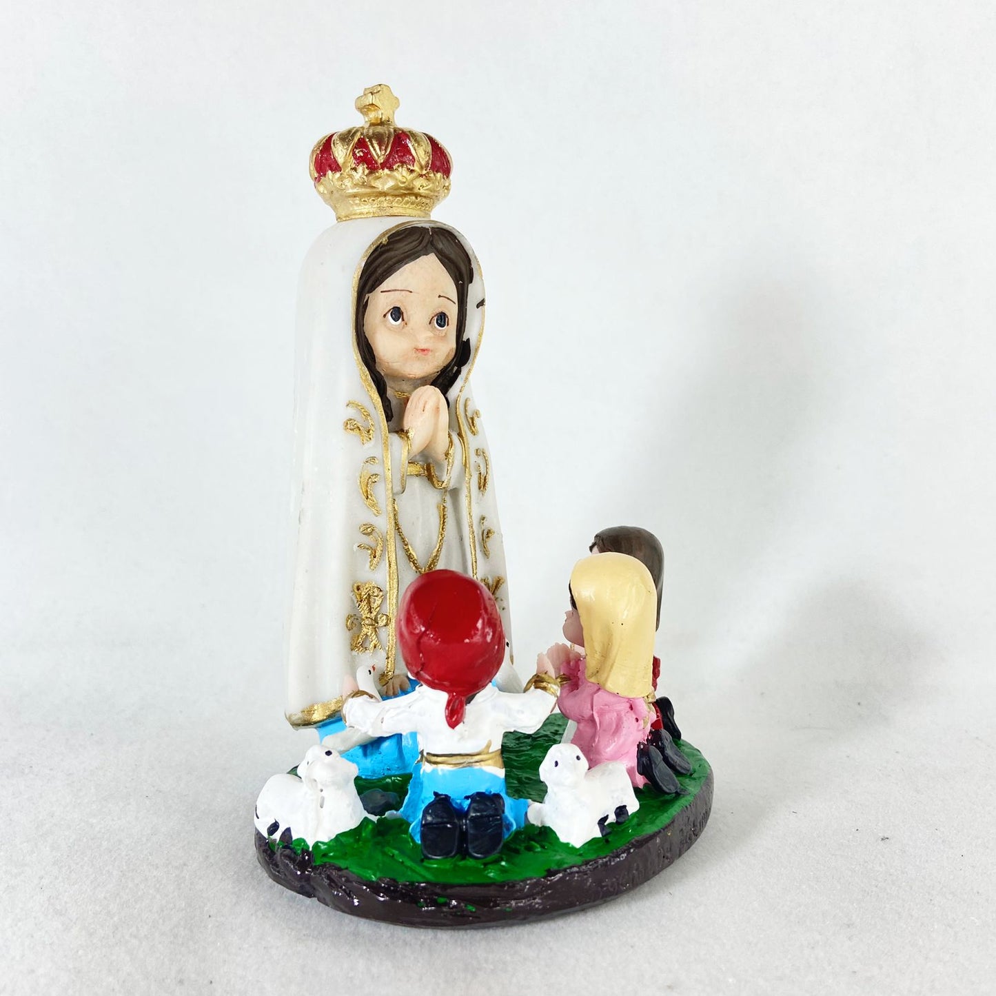 IMAGEM DE RESINA NACIONAL NOSSA SENHORA DE FÁTIMA COM PASTORES INFANTIL 15CM (1 UNIDADE)