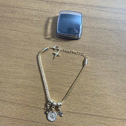 PULSEIRA DOURADA MEDALHA SÃO BENTO COM STRASS (6 UNIDADES)