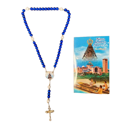 TERÇO PÉROLA AZUL COM MEDALHA RESINADA NOSSA SENHORA APARECIDA 6MM (1 UNIDADE)
