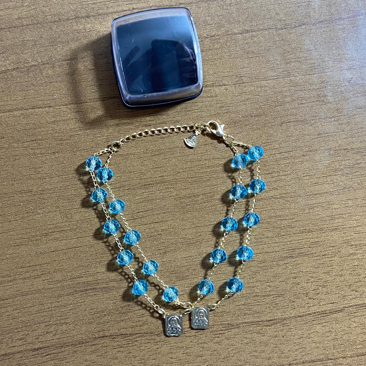 PULSEIRA ESCAPULARIO CRISTAL AZUL CLARO (3 UNIDADES)
