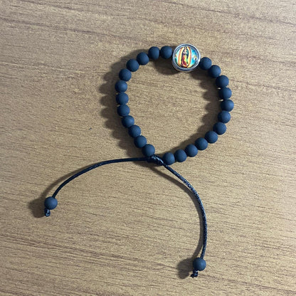 PULSEIRA EMBORRACHADA NOSSA SENHORA DE GUADALUPE PRETA REGULÁVEL (6 UNIDADES)