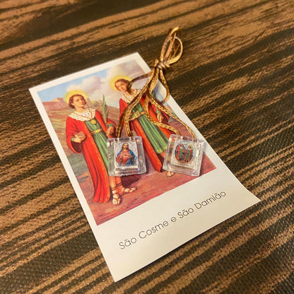 ESCAPULÁRIO CORDINHA SAGRADO CORAÇÃO DE JESUS E COSME E DAMIÃO (12 UNIDADES)