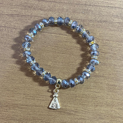 PULSEIRA CRISTAL CINZA TRANSPARENTE NOSSA SENHORA APARECIDA  (06 UNIDADES)