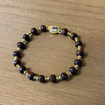 PULSEIRA DE MADEIRA COM MEDALHA NOSSA SENHORA DA IMACULADA CONCEIÇÃO (01 UNIDADE)