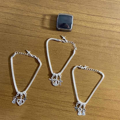 PULSEIRA PRATEADA NOSSA SENHORA APARECIDA MODELOS SORTIDOS COM STRASS (6 UNIDADES)