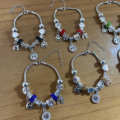 PULSEIRA PRATEADA FÉ COM BERLOQUES  (6 UNIDADES)