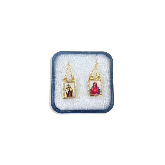 ESCAPULÁRIO DOURADO RESINADO SAGRADO CORAÇÃO DE JESUS E NOSSA SENHORA DO CARMO ( 6 UNIDADE)