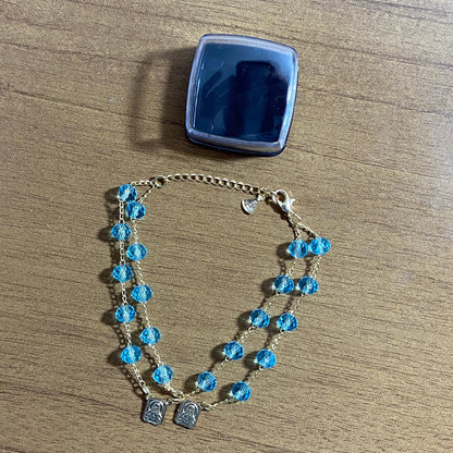 PULSEIRA ESCAPULARIO CRISTAL AZUL CLARO (3 UNIDADES)
