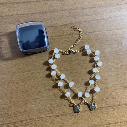 PULSEIRA ESCAPULARIO CRISTAL CREME (3 UNIDADES)
