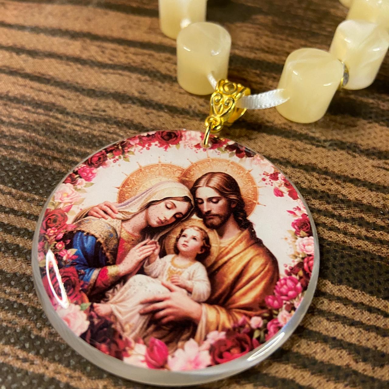 DEZENA PEDRARIAS MEDALHÃO RESINADO SAGRADA FAMÍLIA  12MM  (1 UNIDADE)