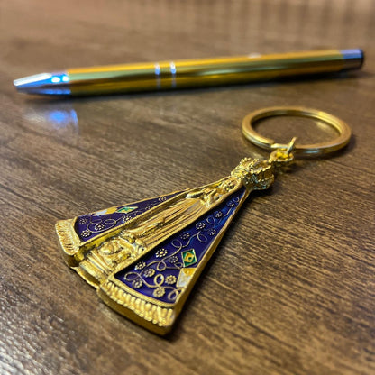 KIT CANETA COM CHAVEIRO NOSSA SENHORA APARECIDA DOURADO ( 1 UNIDADE)