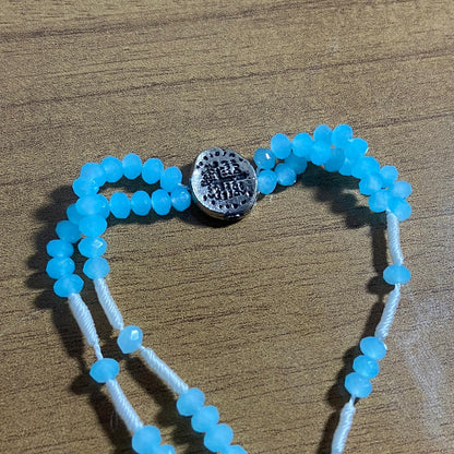 TERÇO PULSEIRA CRISTAL DUAS MEDALHAS AZUL BEBÊ  (3 UNIDADES)