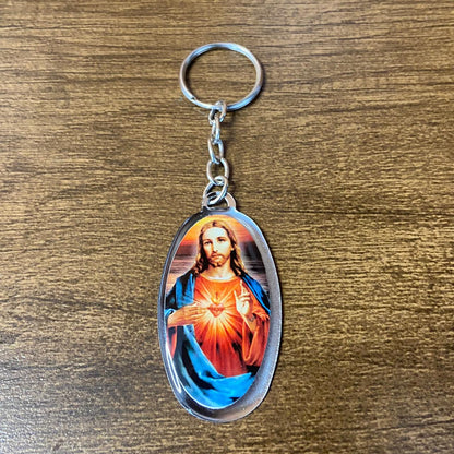 CHAVEIRO METAL OVAL RESINADO SAGRADO CORAÇÃO DE JESUS (6 UNIDADES)